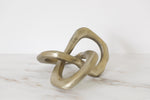 BRASS LOOPED DECORATIVE OBJECT